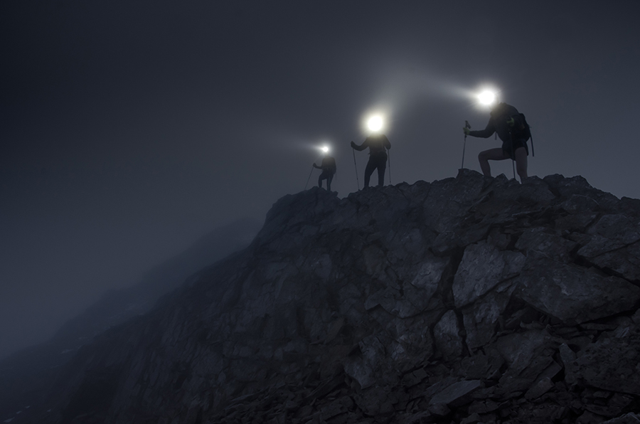Pack a Headlamp Everest Base Camp with Three Hikers Wearing Headlamp