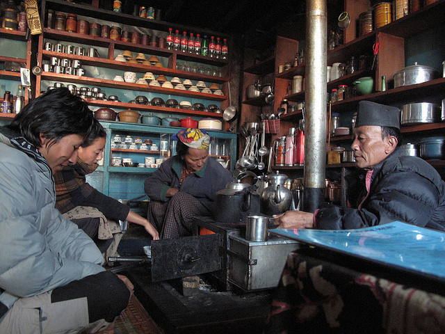 Breakfast round the stove at Teahouse Nepal
