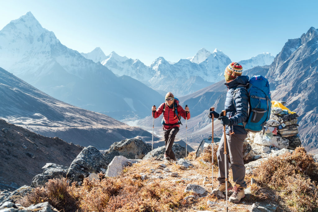 Two Hikers on Everest Base Camp Trek with Trekking Poles, tip for Everest Base Camp Trekking Bring Trekking Poles